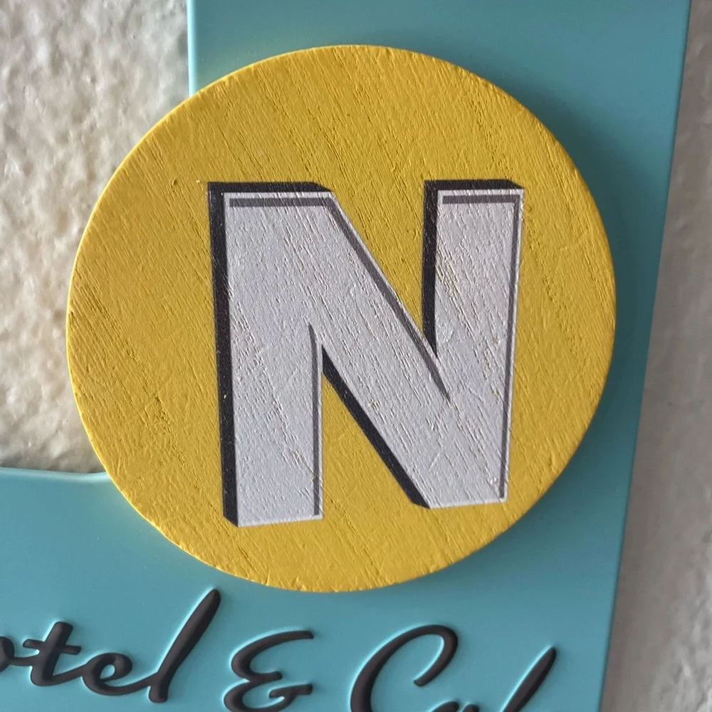 Novelty Wall Decor SUN Motel & Cafe Hanging Sign Target Bullseye